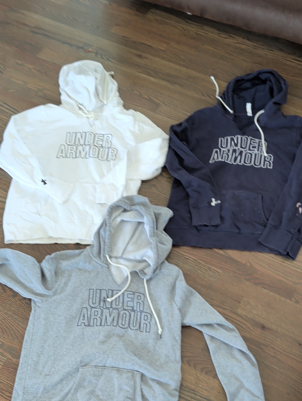 Three Under Armour Women's Sweatshirts